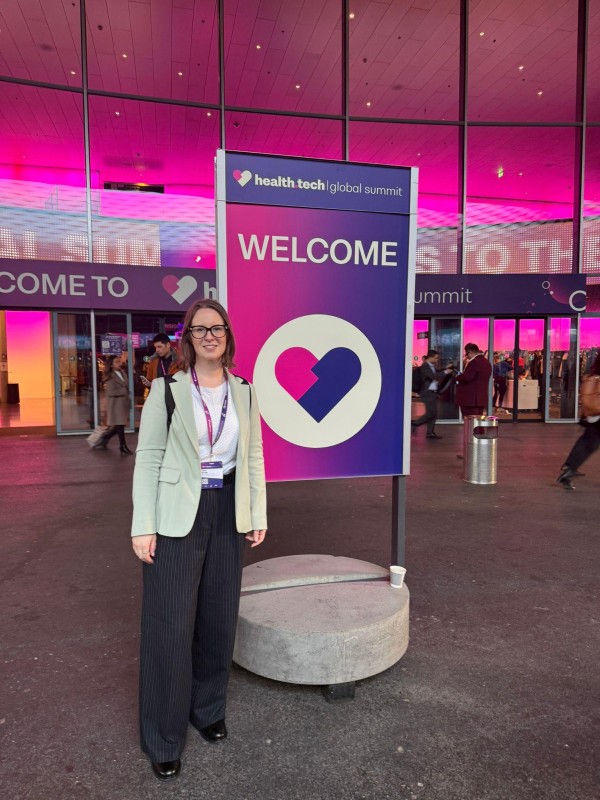 Lauma Spriņģe posing in front of the summit in Basel