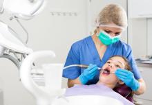 Dentist working on a patient's teeth